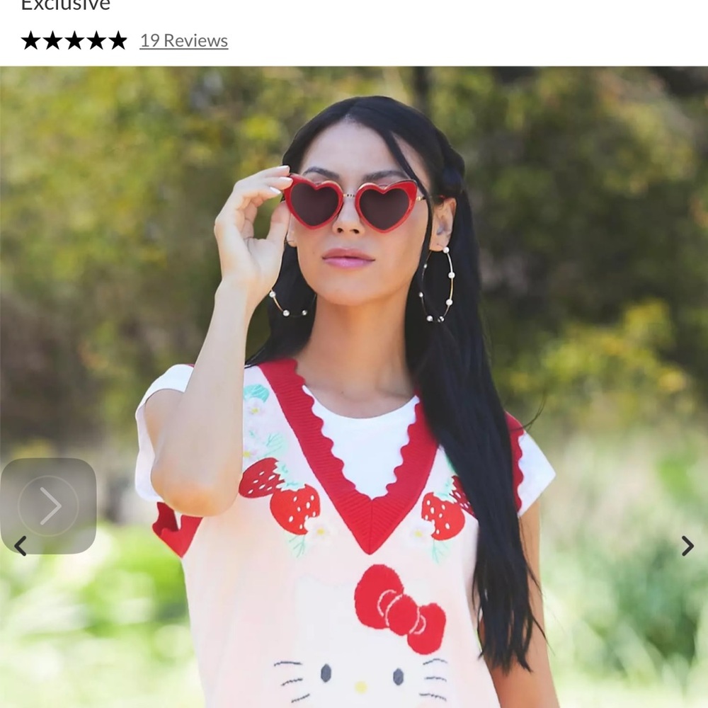 Hello Kitty Strawberry  sweater vest. New with tags. Boxlunch.